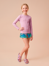 Load image into Gallery viewer, Model Front: Kids' Long Sleeve Rash Guard — Rose Pink, UPF50+
